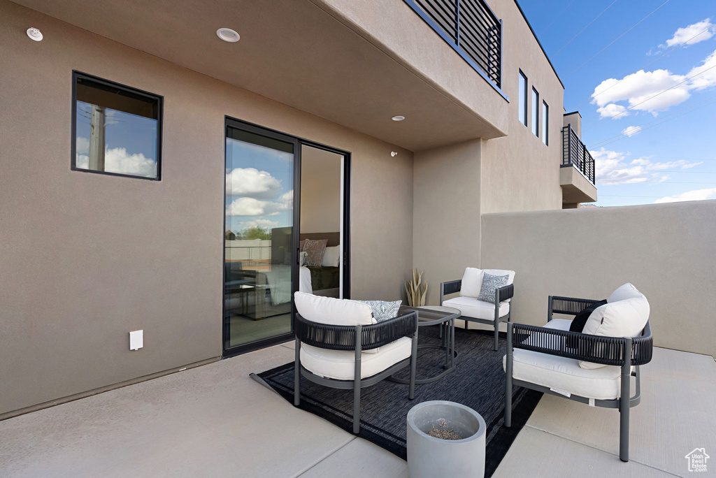 View of patio / terrace featuring a balcony