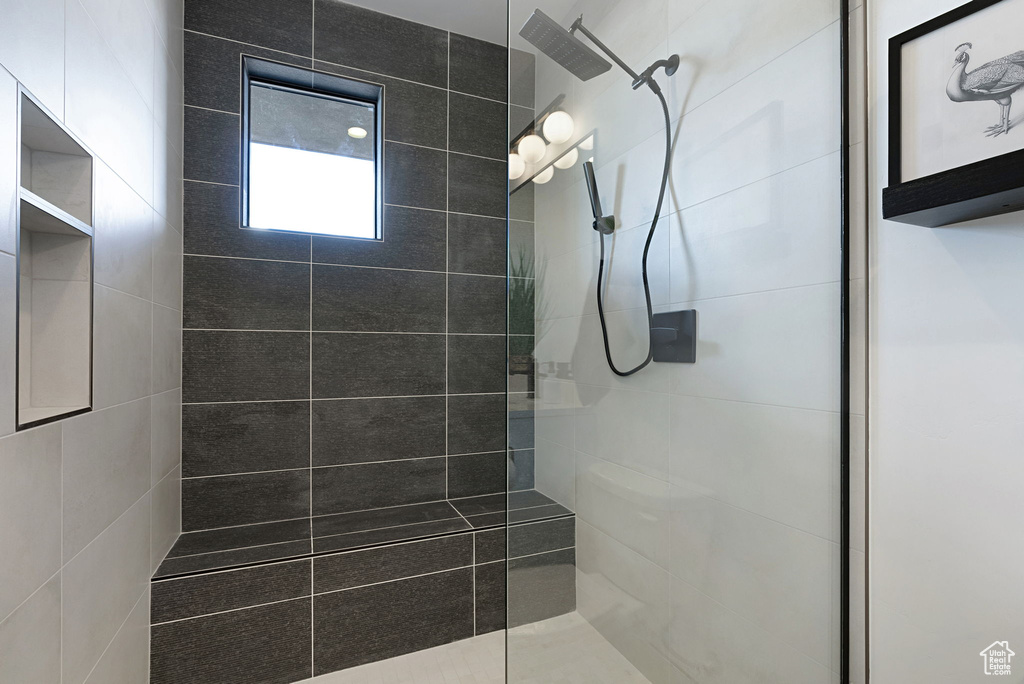 Bathroom with tiled shower