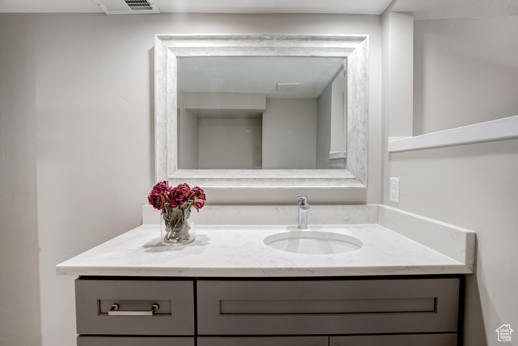 Bathroom featuring large vanity