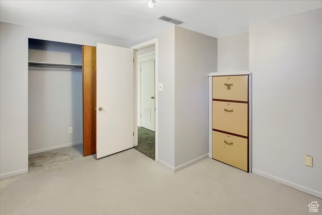 Unfurnished bedroom featuring a closet