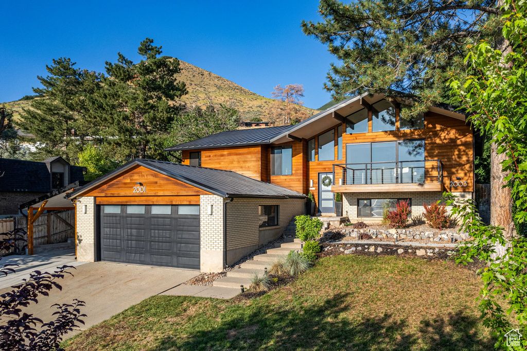Contemporary home featuring a mountain view