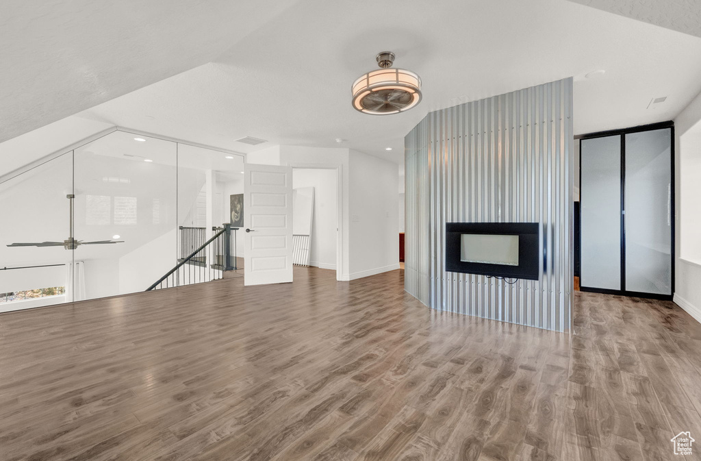 Additional living space featuring hardwood / wood-style flooring