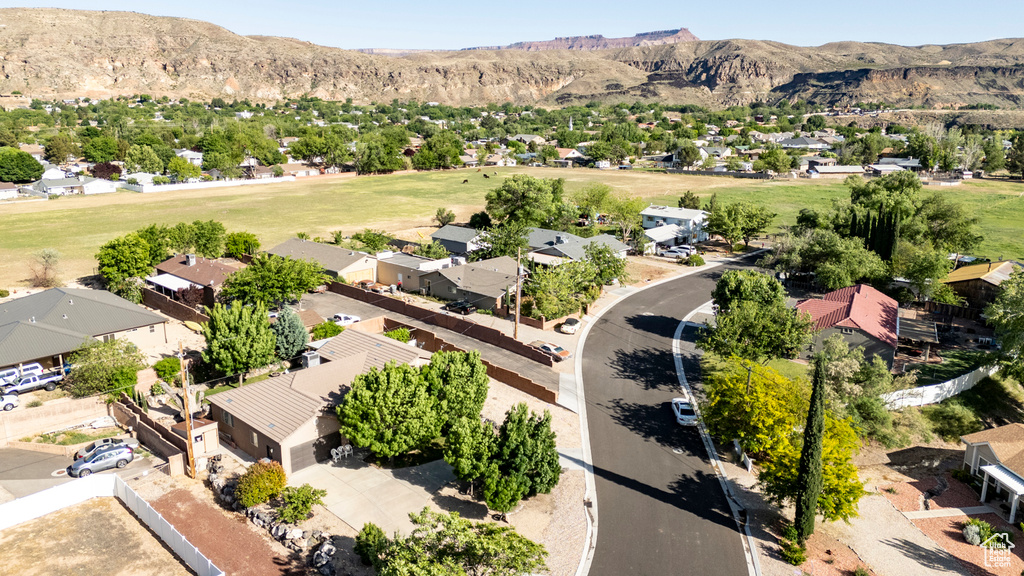 Birds eye view of property featuring a mountain view