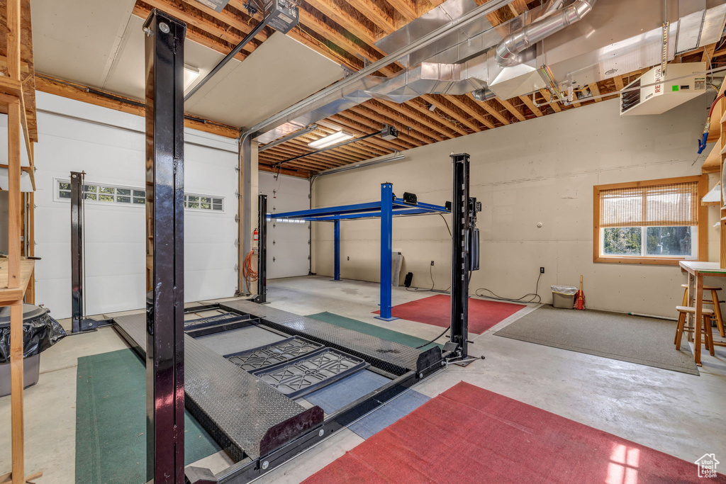 Exercise room featuring concrete floors