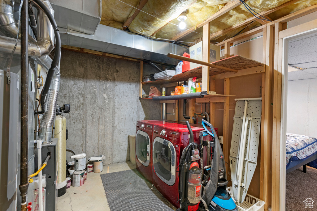 Laundry area with independent washer and dryer and hookup for a washing machine