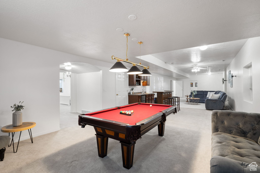 Rec room featuring indoor bar, billiards, and carpet flooring