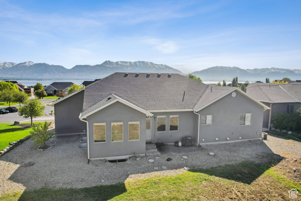 Rear view of house with a mountain view