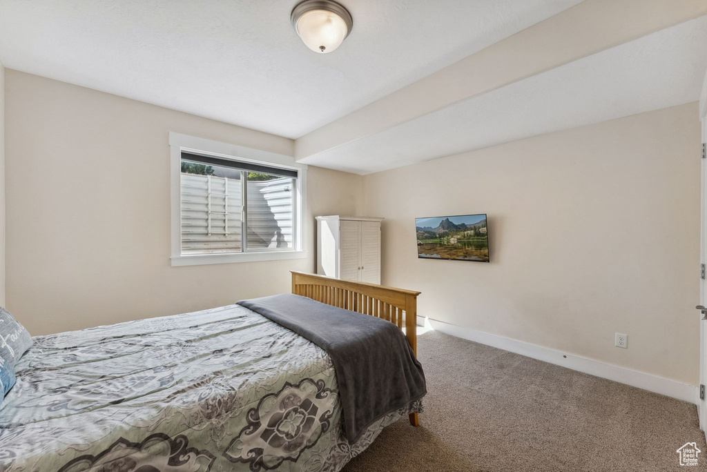 Bedroom with carpet