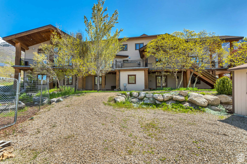 View of front of property featuring a balcony