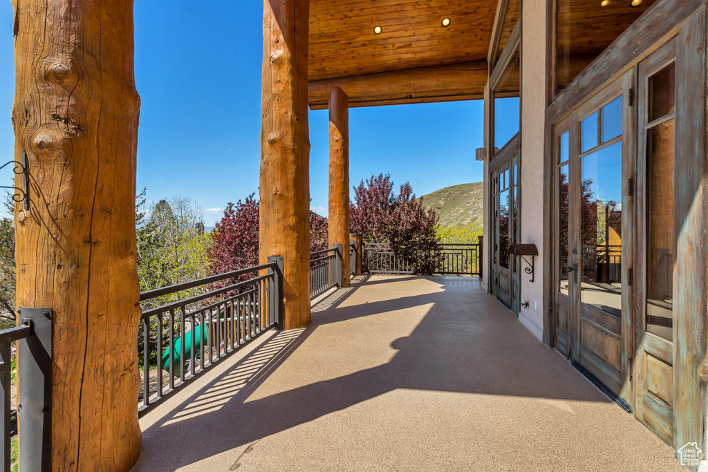 View of terrace featuring a mountain view and a balcony