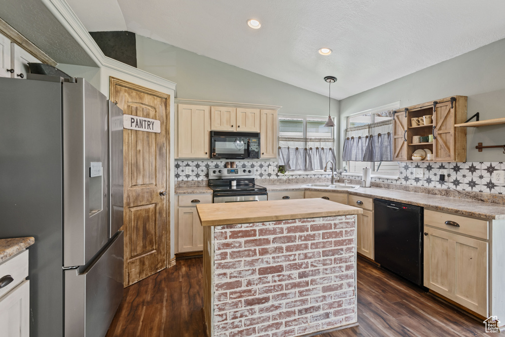 Kitchen featuring lofted ceiling, backsplash, black appliances, and dark hardwood / wood-style floors
