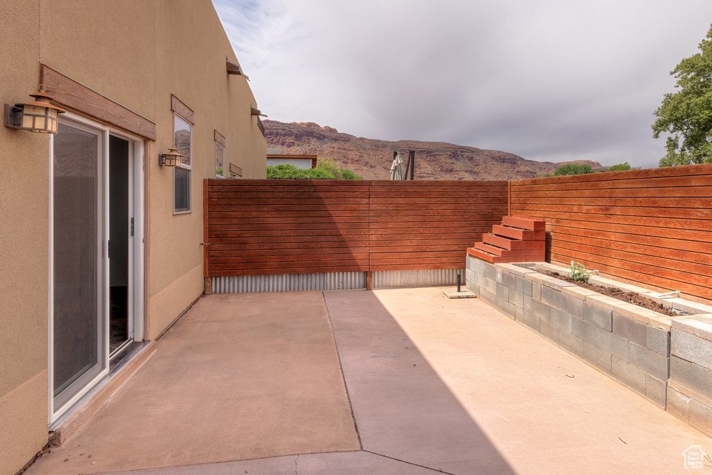 View of patio / terrace featuring a mountain view