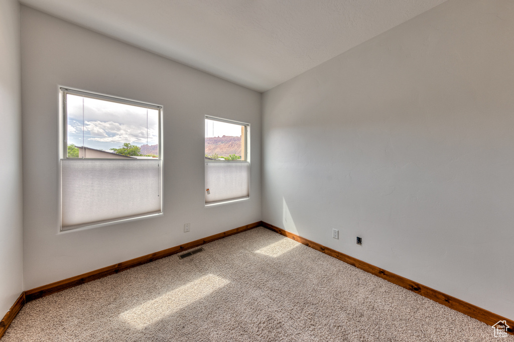 View of carpeted spare room