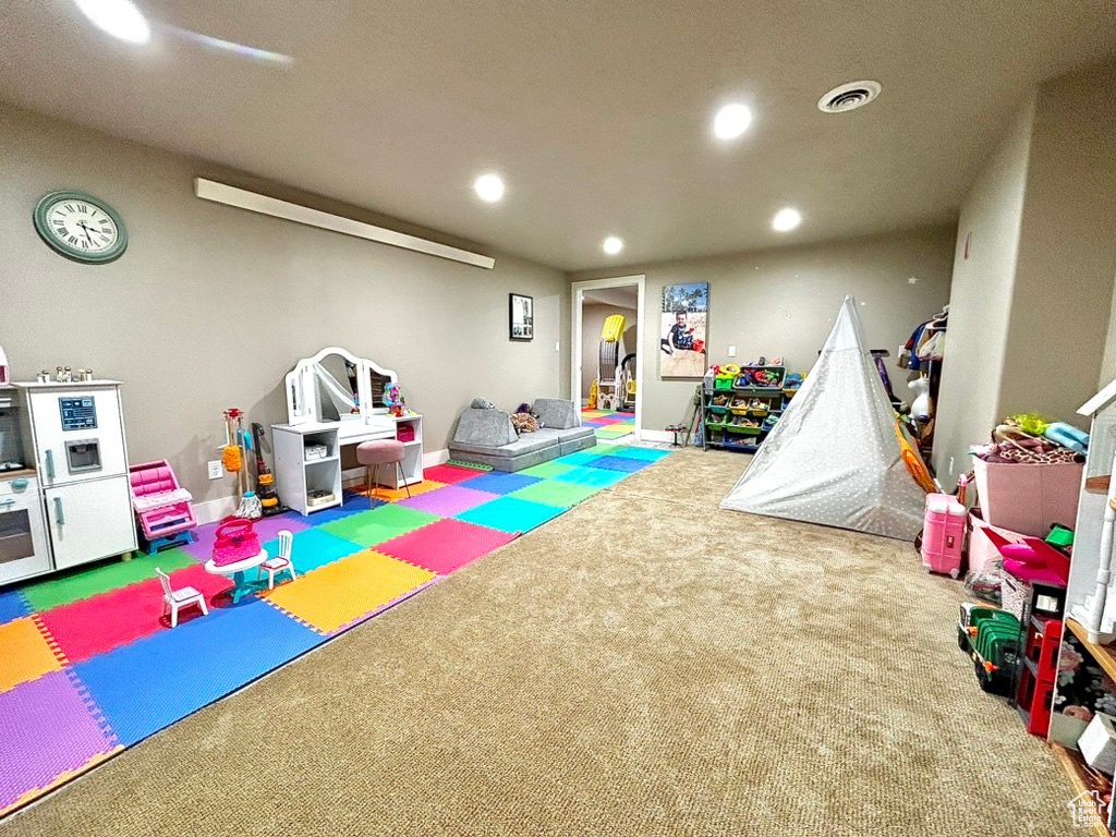 Recreation room featuring carpet flooring