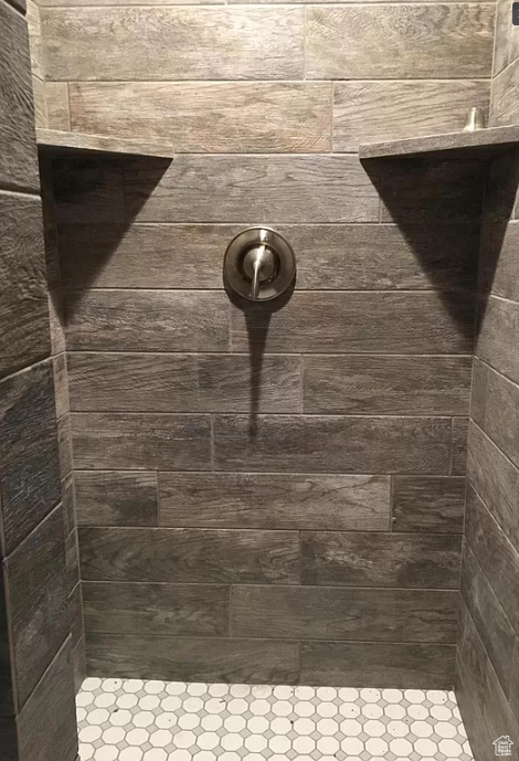 Interior space featuring a tile shower