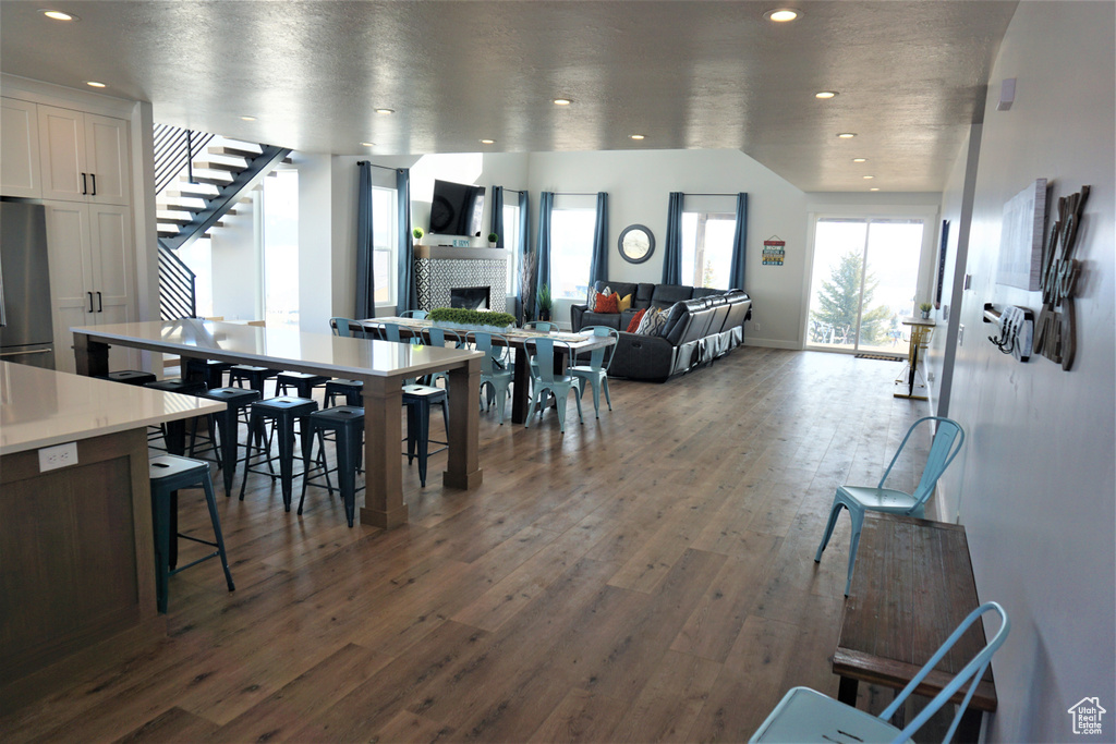 Dining area with hardwood / wood-style flooring