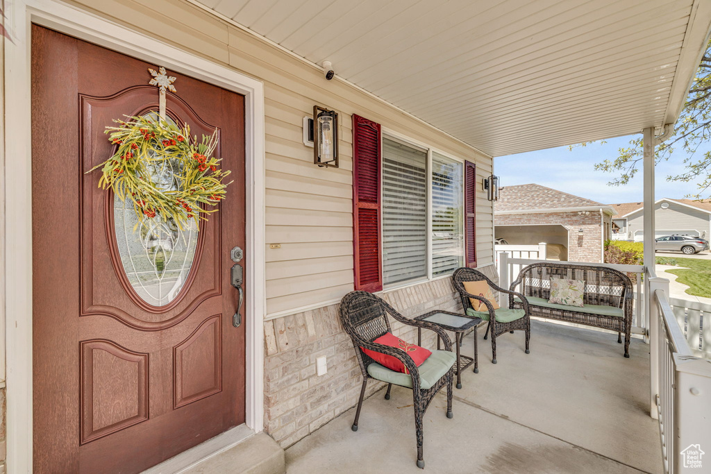 Property entrance featuring a porch