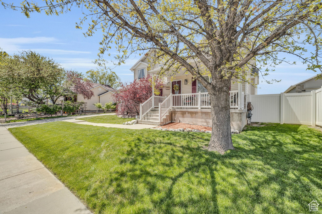 View of front of home featuring a front lawn