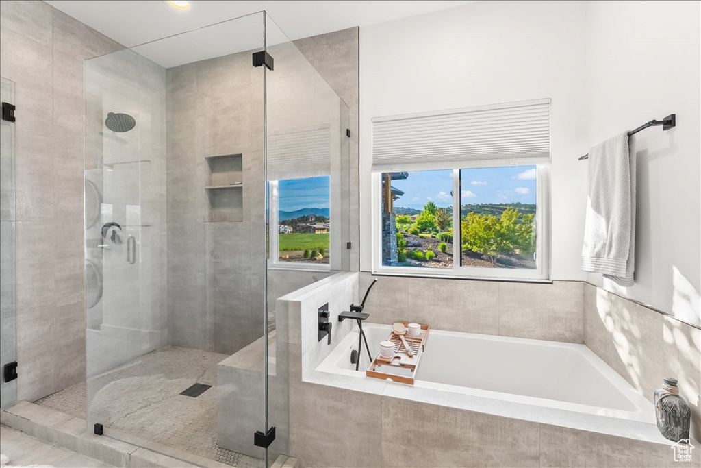 Bathroom with plus walk in shower