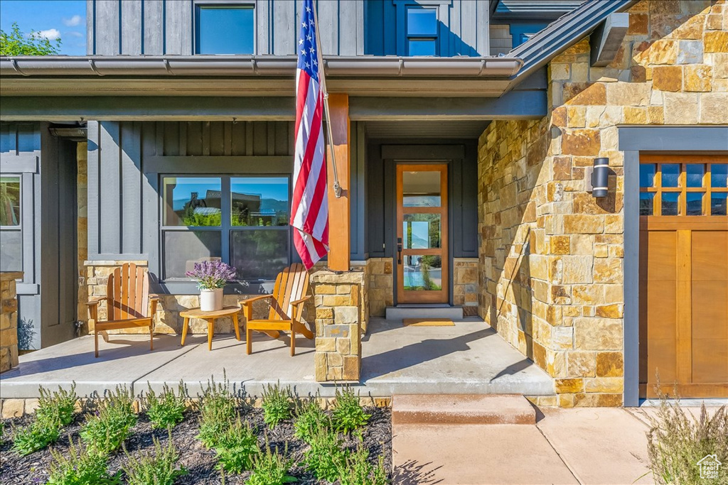 Property entrance with a garage