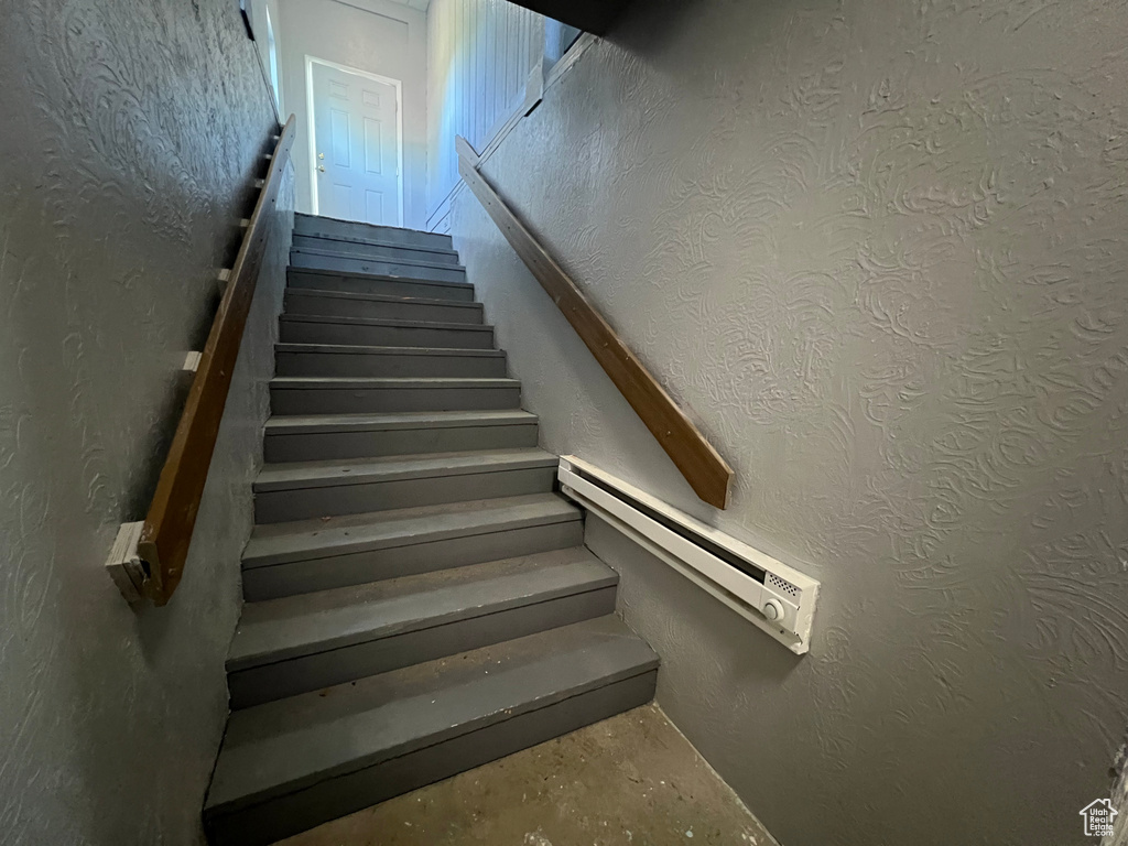 Stairway with baseboard heating