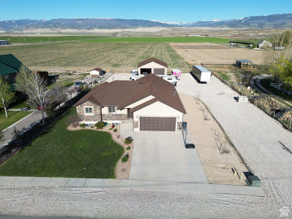 Drone / aerial view with a rural view and a mountain view