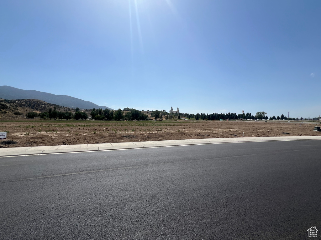 View of road with a mountain view and a rural view