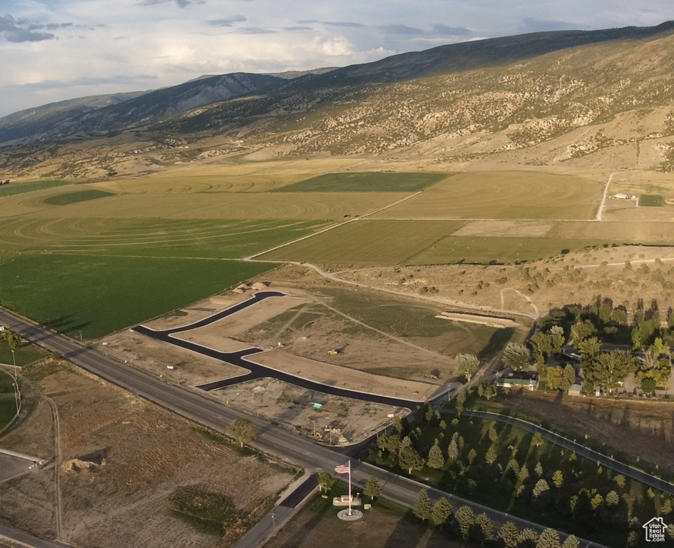 Drone / aerial view featuring a mountain view and a rural view