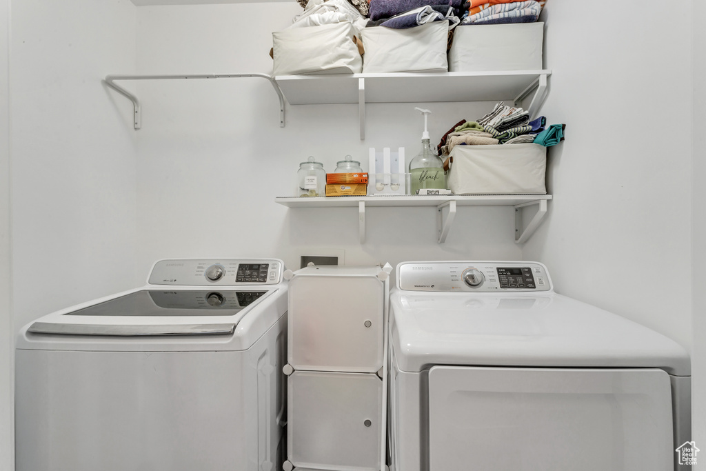 Washroom featuring independent washer and dryer and hookup for a washing machine