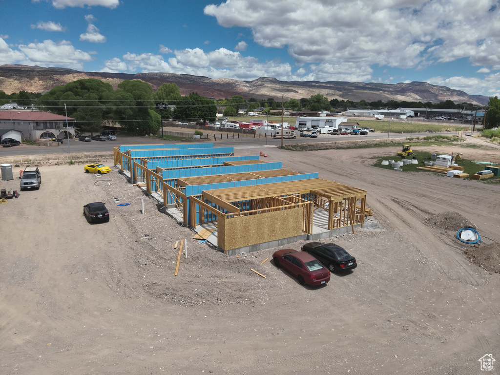 Birds eye view of property with a mountain view