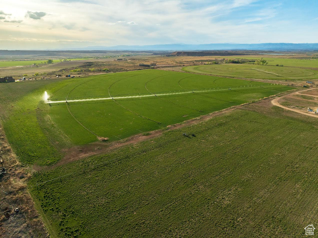 Birds eye view of property with a rural view