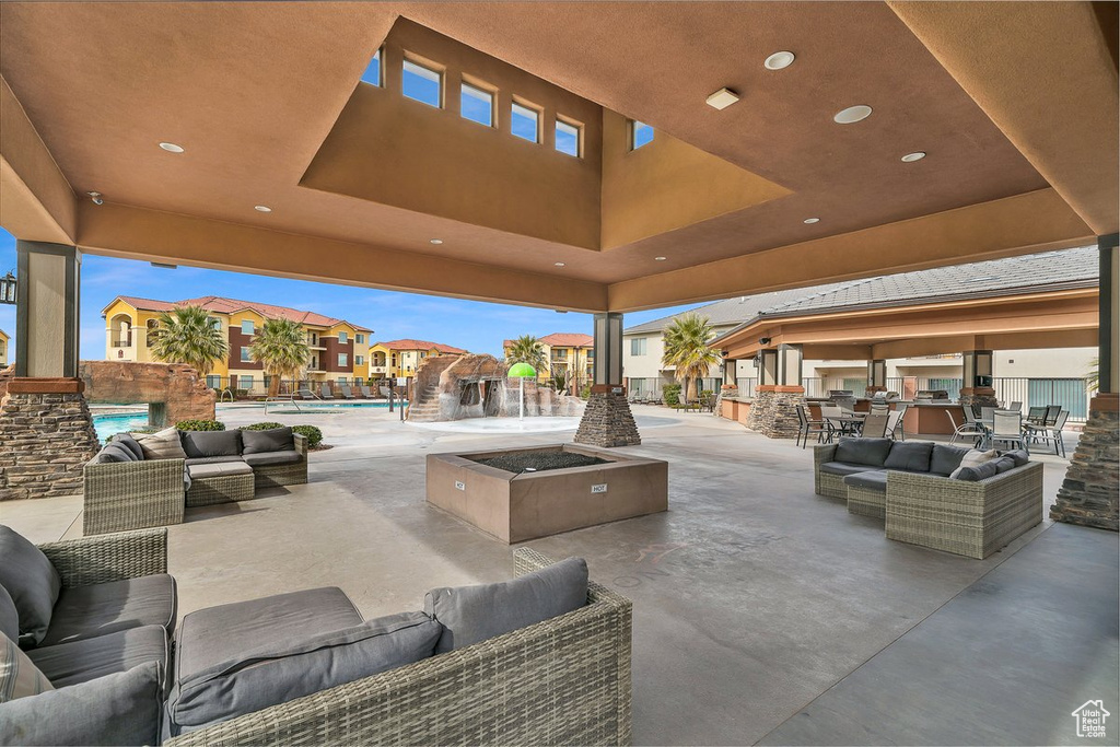 View of patio with an outdoor hangout area