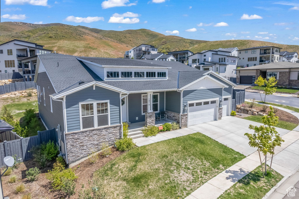 View of front of home featuring a mountain view