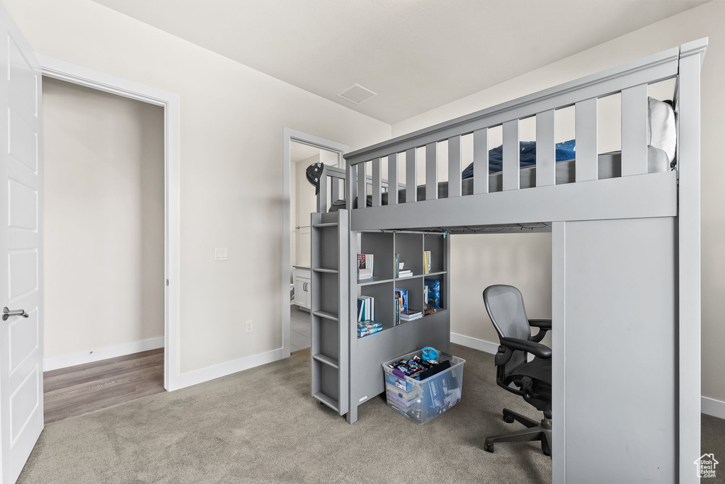 Bedroom featuring carpet floors