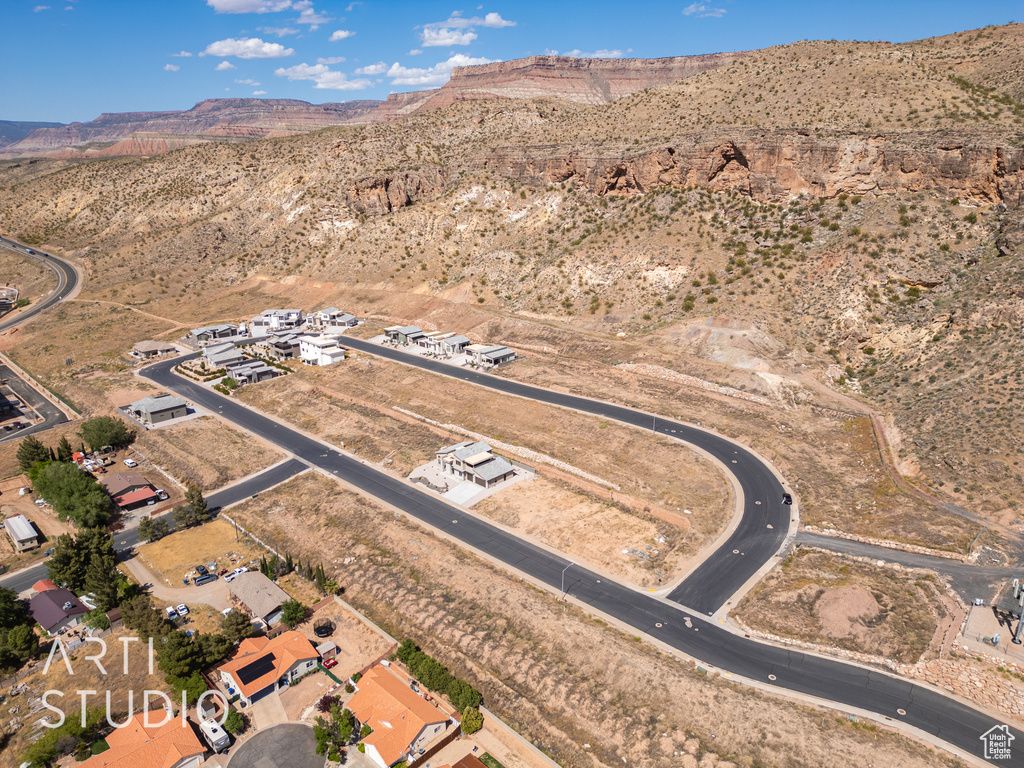 Birds eye view of property featuring a mountain view