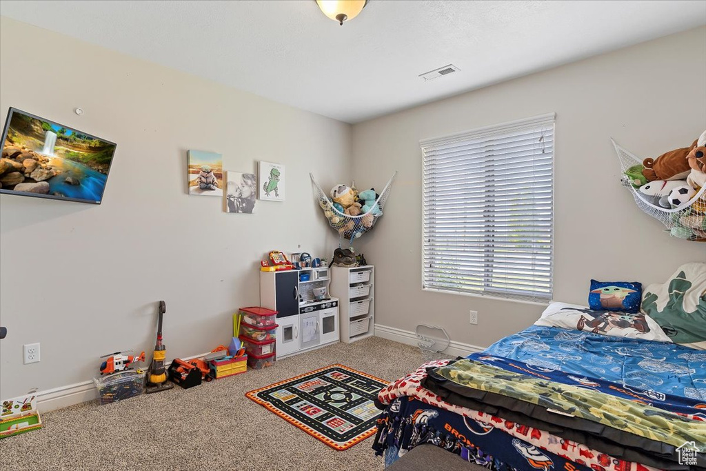 View of carpeted bedroom