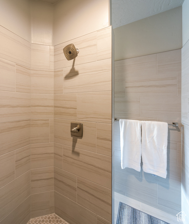 Bathroom with a tile shower