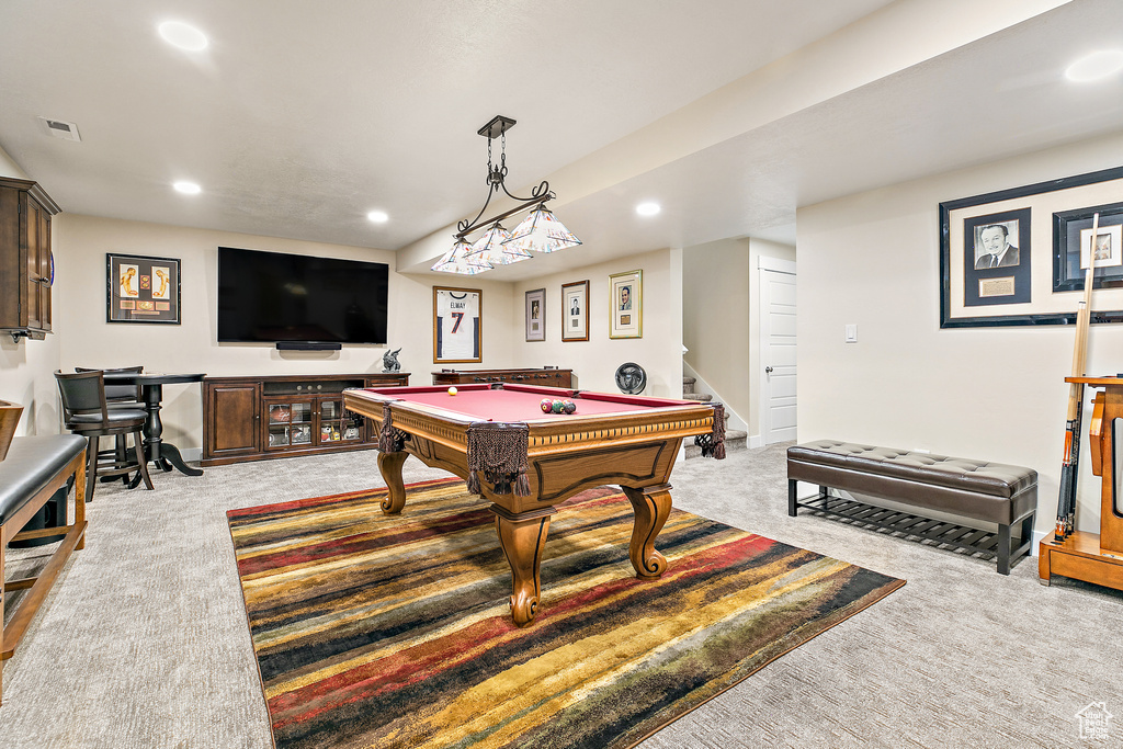 Recreation room featuring light carpet and billiards