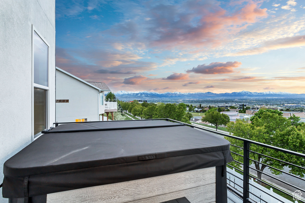 Exterior space with a mountain view and a balcony