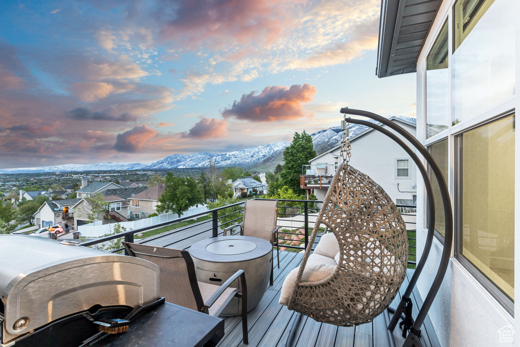 Deck at dusk with a mountain view