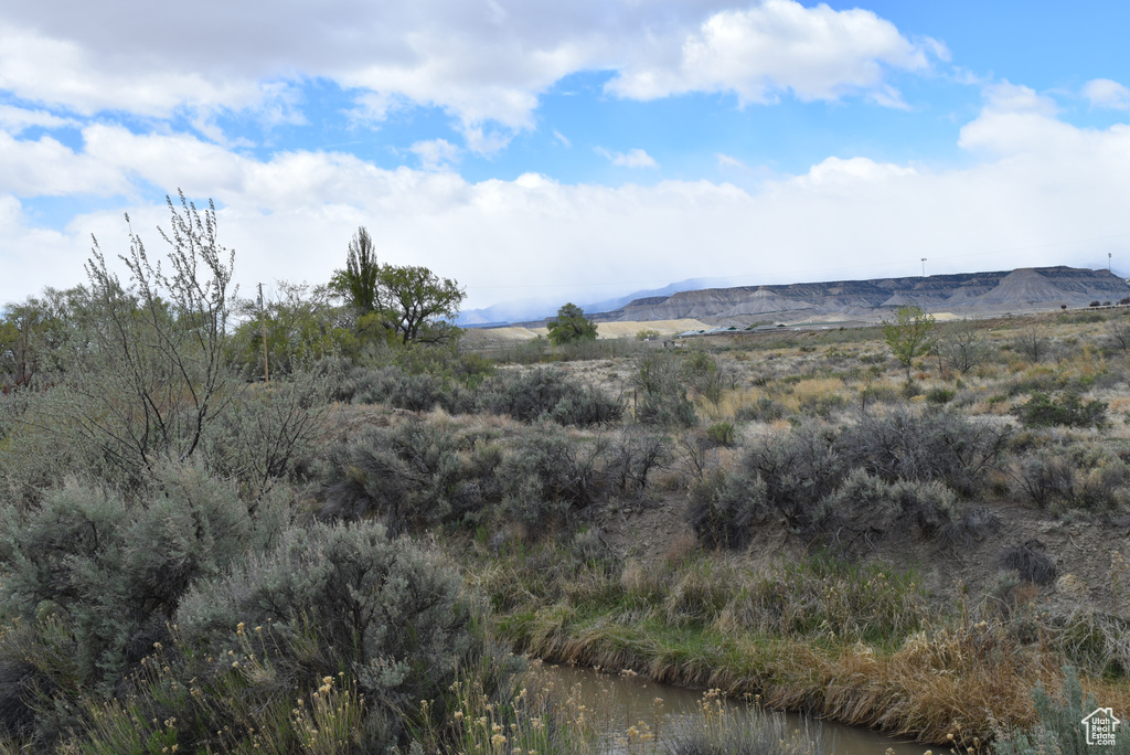 View of mountain feature with a water view