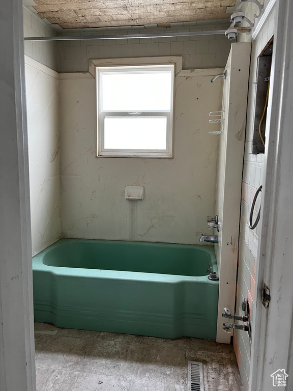 Bathroom featuring shower / bathing tub combination