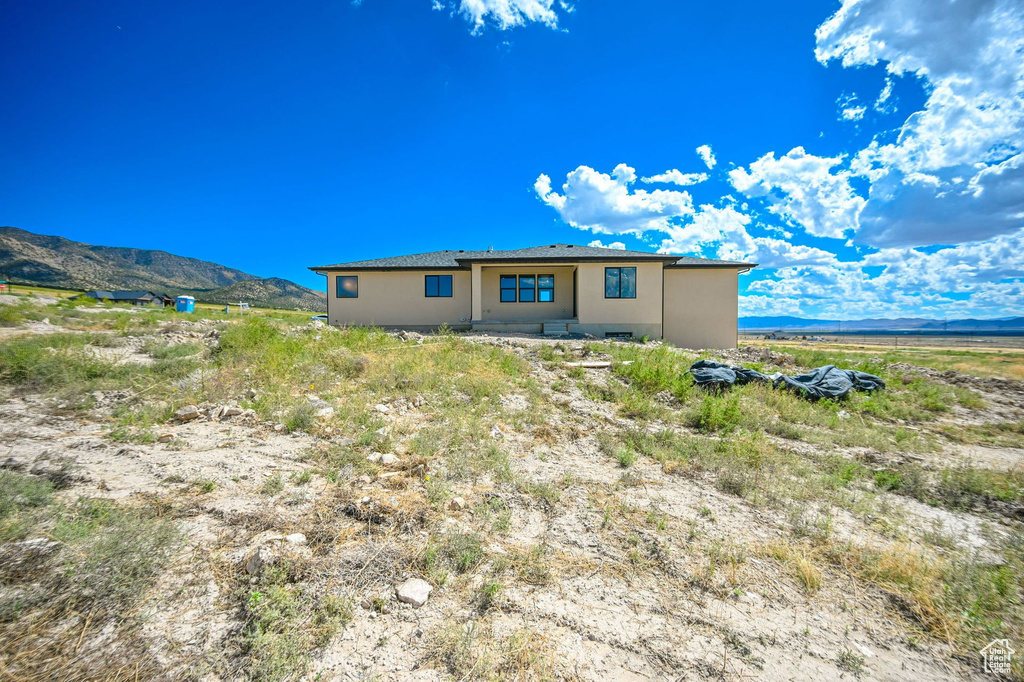 View of front of home with a mountain view