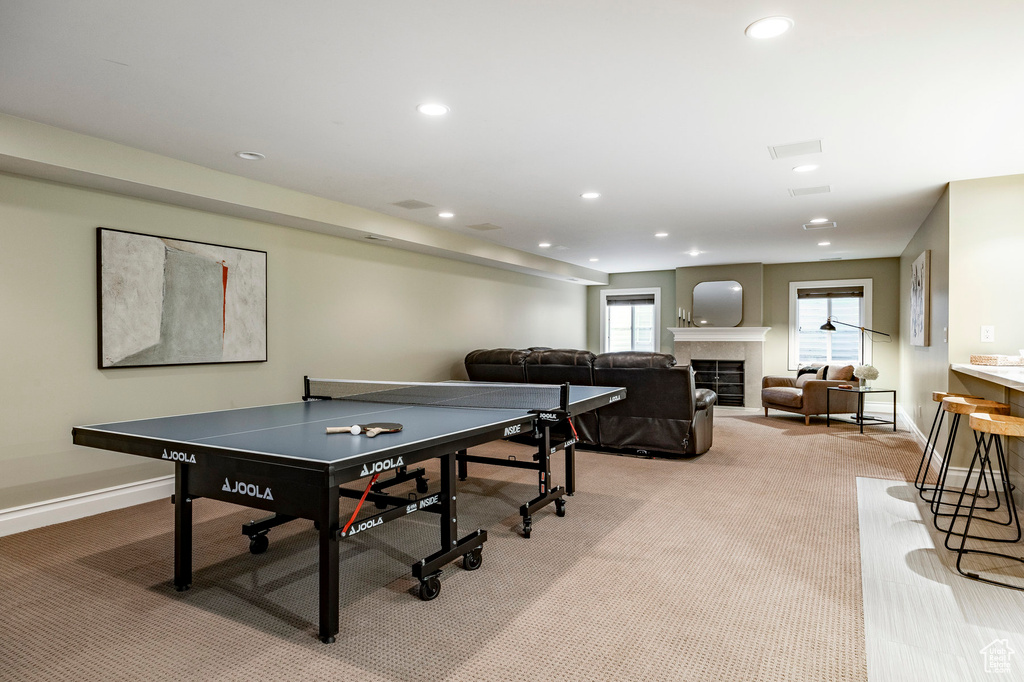 Playroom featuring light colored carpet