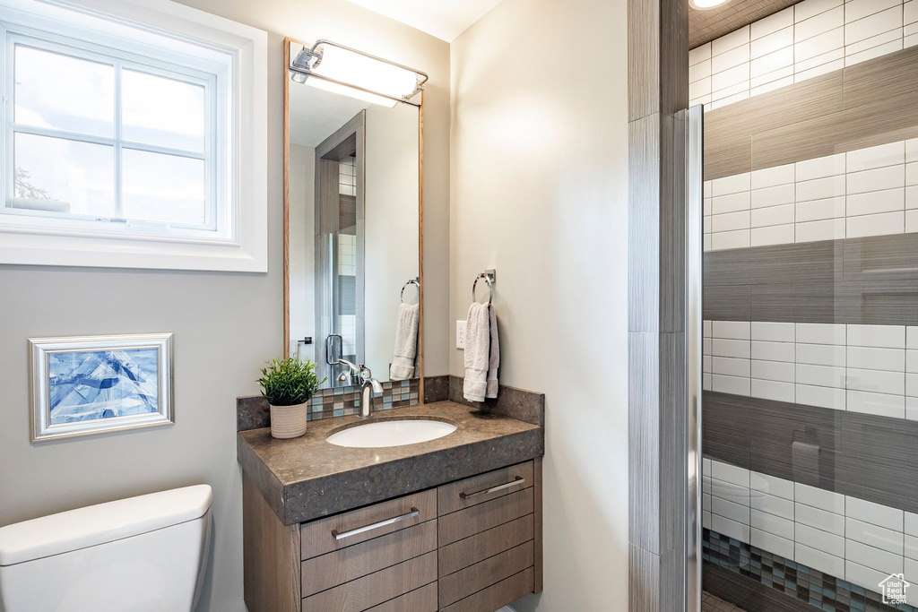 Bathroom featuring toilet and vanity