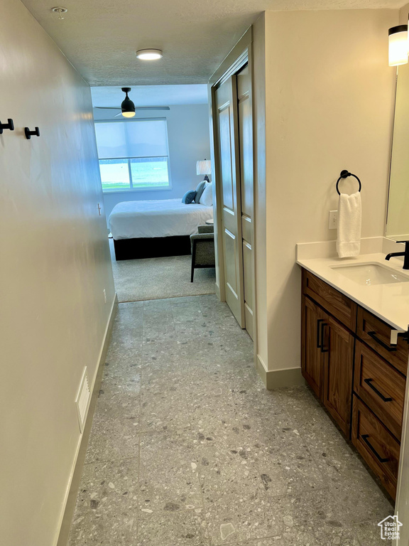 Bathroom with vanity and tile flooring