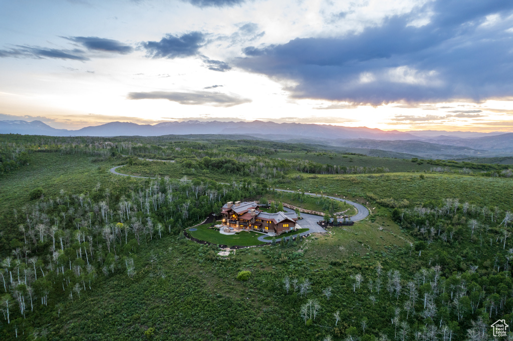 Aerial view of property\\\'s location with a mountain backdrop