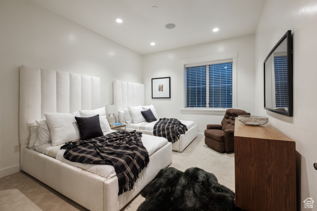 Carpeted bedroom featuring recessed lighting and baseboards