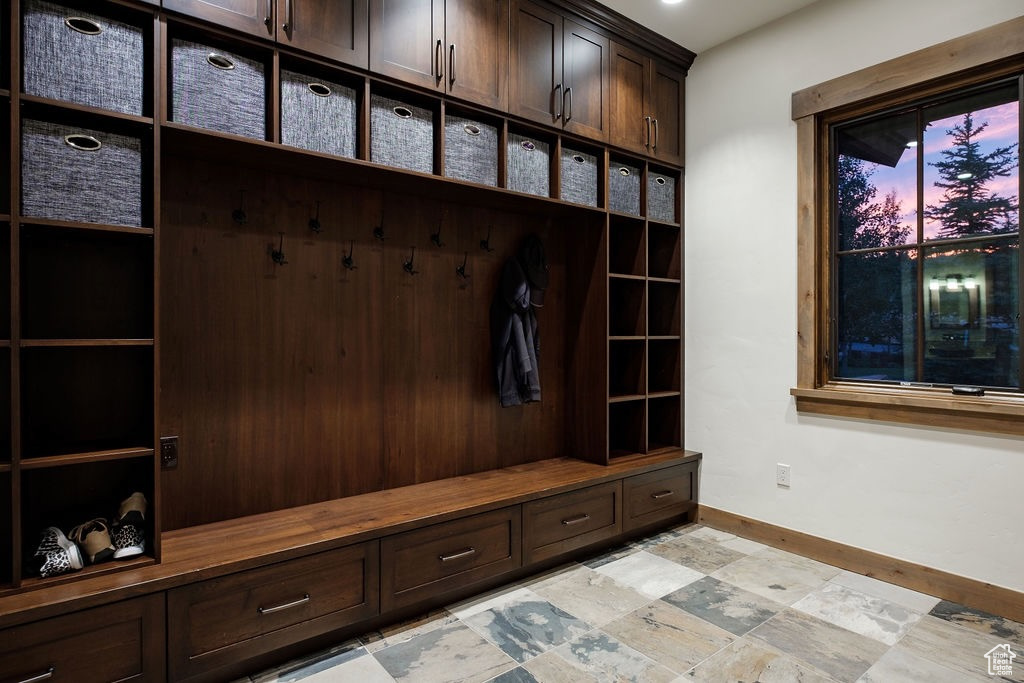 Mudroom with light tile floors