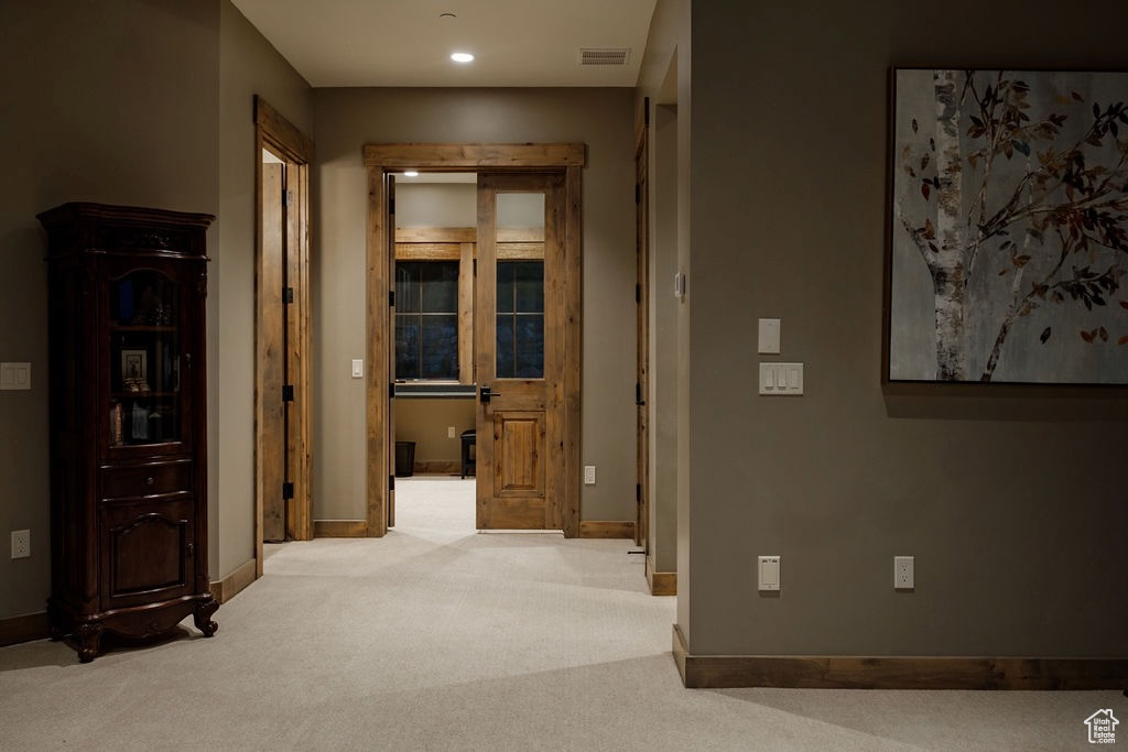 Hallway with carpet